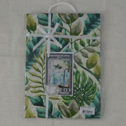 Nappe ourlée en toile ou tissu enduit avec un motif de feuilles  pour un esprit "Jungle"
