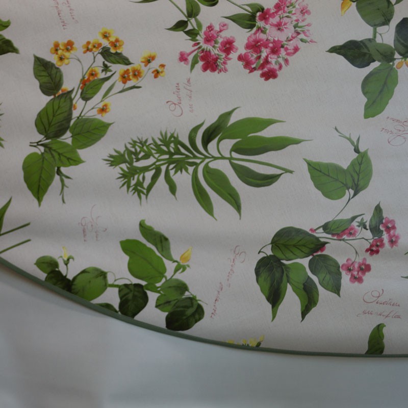 Toile cirée ronde de 4 à 6 couverts finie par un biais avec un motif moderne