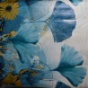 Toile cirée standard en 160 cm de large avec un motif de grandes feuilles bleues