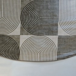 Toile cirée ronde de 4 à 6 couverts finie par un biais avec un motif moderne