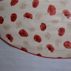 Toile cirée ronde pour 4 à 6 couverts, finie par un biais coloré avec des coquelicots sur fond beige