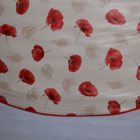 Toile cirée ronde pour 4 à 6 couverts, finie par un biais coloré avec des coquelicots sur fond beige