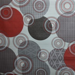 Toile cirée standard en 160 cm de large, un mélange de ronds colorés, esprit "mandalas" rouges et gris