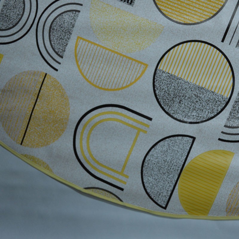 Toile cirée ronde, finie par un biais, pour 4à 6 couverts, avec un motif ultra moderne