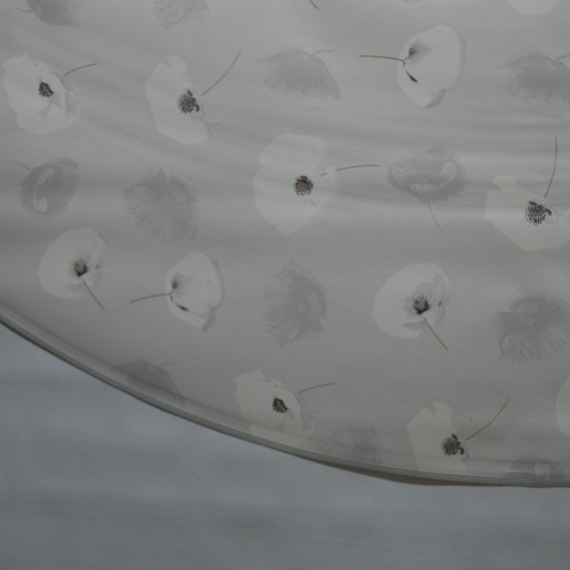 Toile cirée ronde 4 à 6 couverts avec de jolis coquelicots blancs, finie par un biais