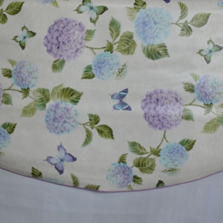 Toile cirée ronde, finie par un biais, pour 4 à 6 couverts, de jolis hortensias bleus et violacés
