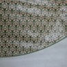 Toile cirée ronde, finie par un biais pour 4 à 6 couverts avec un motif original et moderne