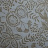 Toile cirée standard avec des fleurs et des feuilles graphiques taupe