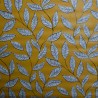 Toile cirée standard avec un motif de feuilles sur fond moutarde