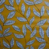 Toile cirée standard avec un motif de feuilles sur fond moutarde