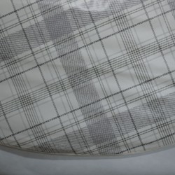 Toile cirée ronde Igor, finie par un biais, pour 4 à 6 couverts, avec un esprit "torchon gris"