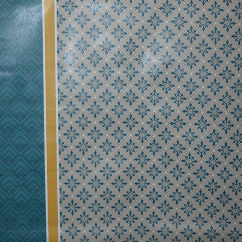 Toile cirée standard en 140 cm de large avec un mélange de motifs originaux et modernes
