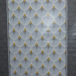 Toile cirée standard en 140 cm de large avec un mélange de motifs originaux et modernes