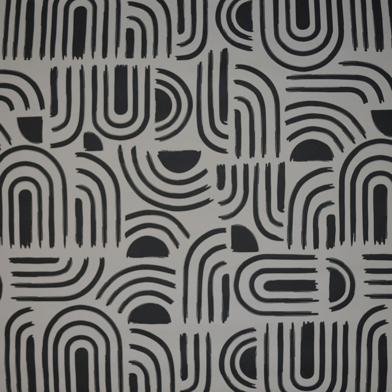 Toile cirée standard en 140 cm de large, des courbes noires pour un aspect ultra moderne