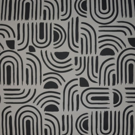 Toile cirée standard en 140 cm de large, des courbes noires pour un aspect ultra moderne