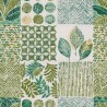 Un patchwork végétal graphique vert pour une table moderne et naturelle.