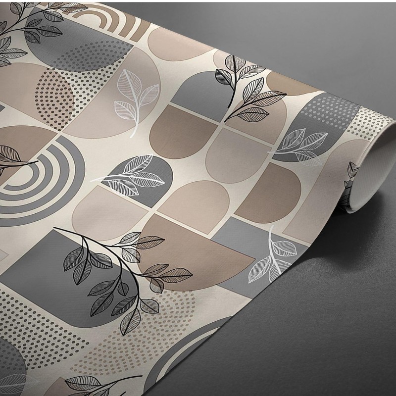 Toile cirée au mètre Nev, aux formes graphiques et de feuillages noirs pour une table moderne et épurée.