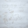 Toile cirée au mètre Annabelle, en 140 cm de large, de jolies fleurs légèrement argentées sur fond blanc...
