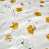 Toile cirée au mètre Freya, motif floral épuré en noir et jaune moutarde sur fond blanc, pour une déco ensoleillée