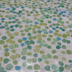 Toile cirée au mètre Jenny, en 180 cm de large, un motif de feuilles vertes et bleues