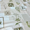 Toile cirée au mètre Jacques, en 180 cm de large, un motif botanique beige avec impression de plantes et herbiers