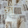Toile cirée au mètre Martine, en 180 cm de large, aux nuances beige et taupe, décorée de feuilles de pampa