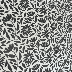 Tissu laminé au mètre Léane, au motif floral noir et blanc au style graphique