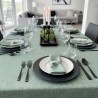 Tissu laminé au mètre Milo, une nappe verte texturée au style naturel et chic