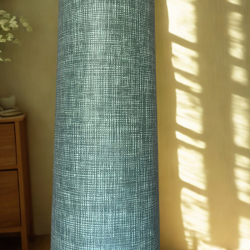 Tissu laminé au mètre Milo, une nappe verte texturée au style naturel et chic