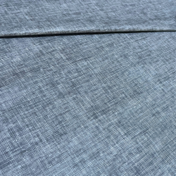 Tissu laminé au mètre Milo anthracite , une nappe grise  texturée au style naturel et chic