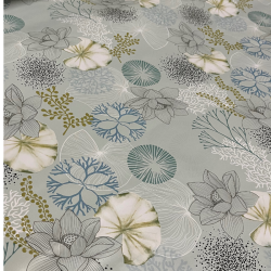 Toile cirée au mètre Nerina, en 160 cm de large, ornée de magnifiques fleurs aquatiques pour sublimer votre table...