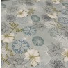 Toile cirée au mètre Nerina, en 160 cm de large, ornée de magnifiques fleurs aquatiques pour sublimer votre table...