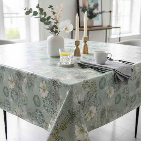 Toile cirée au mètre Nerina, en 160 cm de large, ornée de magnifiques fleurs aquatiques pour sublimer votre table...