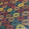 Toile cirée au mètre Nerina, en 160 cm de large, un motif aux lignes ondulées multicolores, idéale pour apporter du caractère