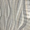 Toile cirée au mètre Ondine, en 180 cm de largeur, motif graphique aux lignes ondulées dans des tons neutres