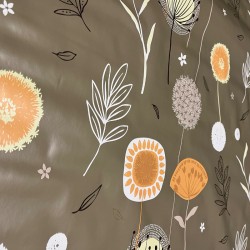 Toile cirée au mètre Amandine, au charme floral délicatement rétro, décliné dans des tons chaleureux