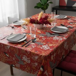 Toile cirée au mètre Anjali rouge, un motif vivant et exotique, des toucans colorés et des feuillages tropicaux