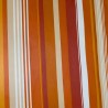 Toile cirée au mètre Camille, un bayadère aux rayures terracotta, ocre et rouge