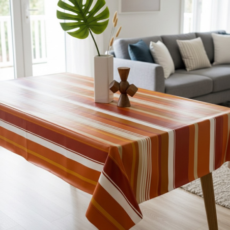 Toile cirée au mètre Camille, un bayadère aux rayures terracotta, ocre et rouge