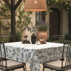 un motif orné de branches de feuilles dans des tons vert olive, de bleu vert et de gris