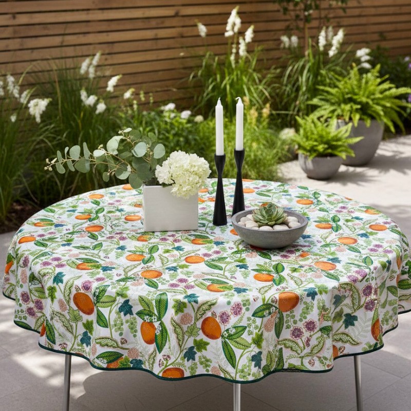 Toile cirée ronde de 4 à 6 couverts, finie par un biais avec des agrumes